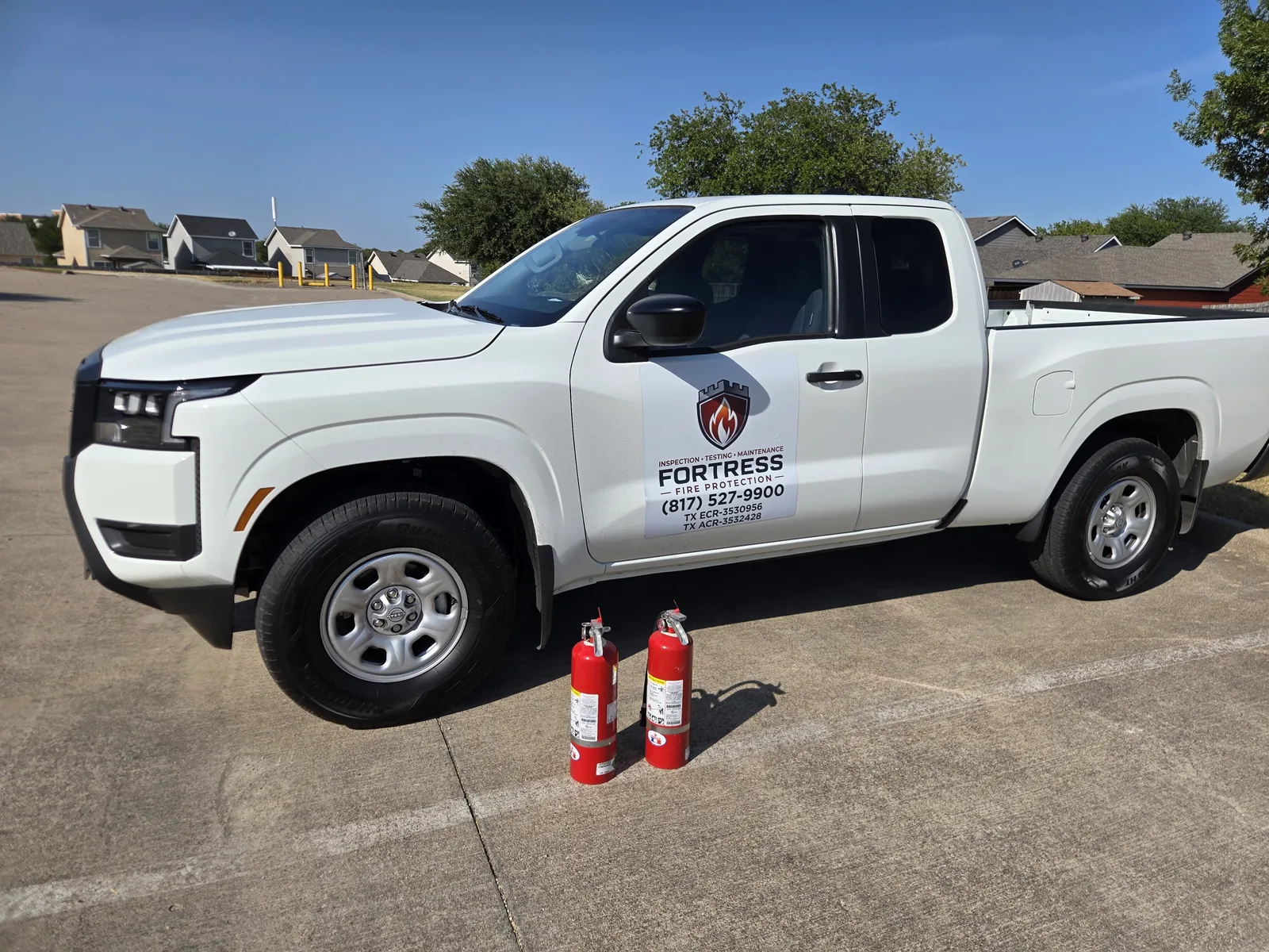 Fortress Fire Protection service truck with fire extinguishers ready for a job